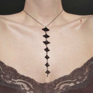 Gothic black vertebrae spiky rosary necklace with a small silver chain